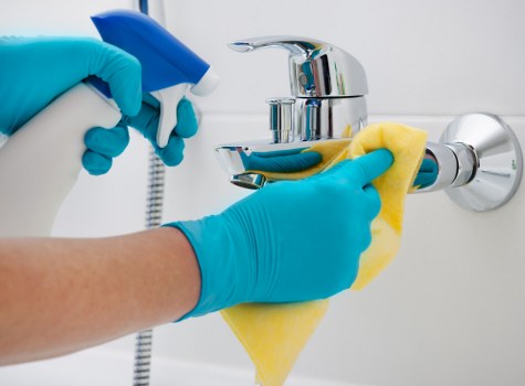 Deep upholstery cleaning service on a fabric sofa